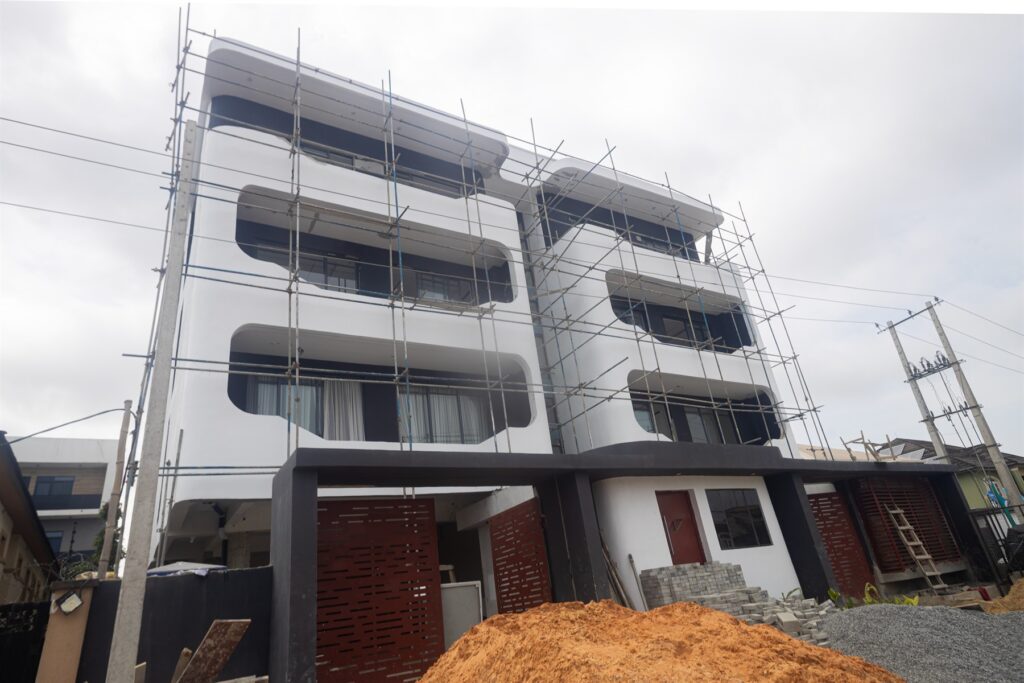 Brum Height 9: Front exterior showing balconies and construction scaffolding
